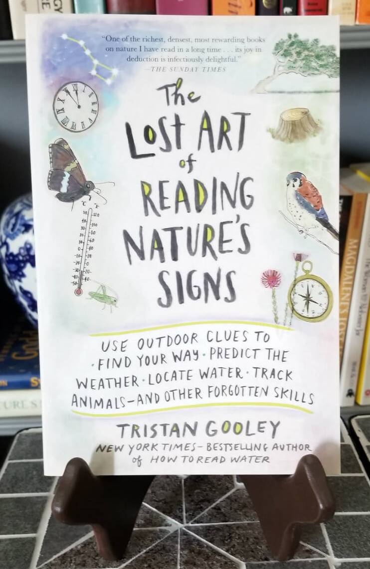 book cover of The Lost Art of Reading Nature's Signs