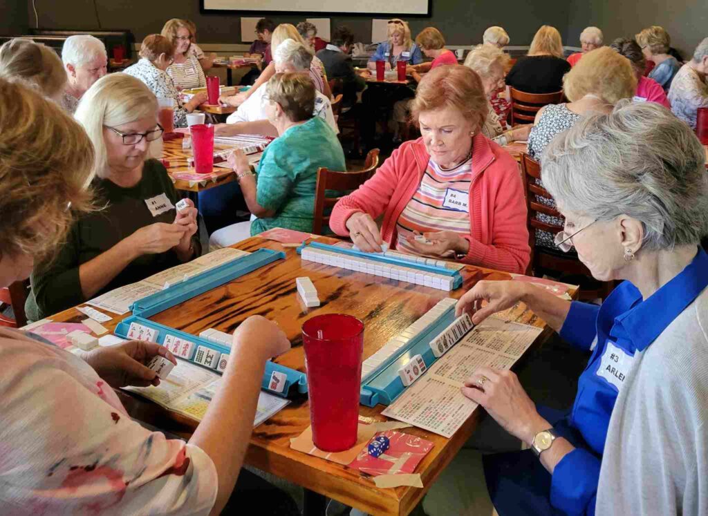 Members of Neighbors of Suntree playing at a mah jongg marathon